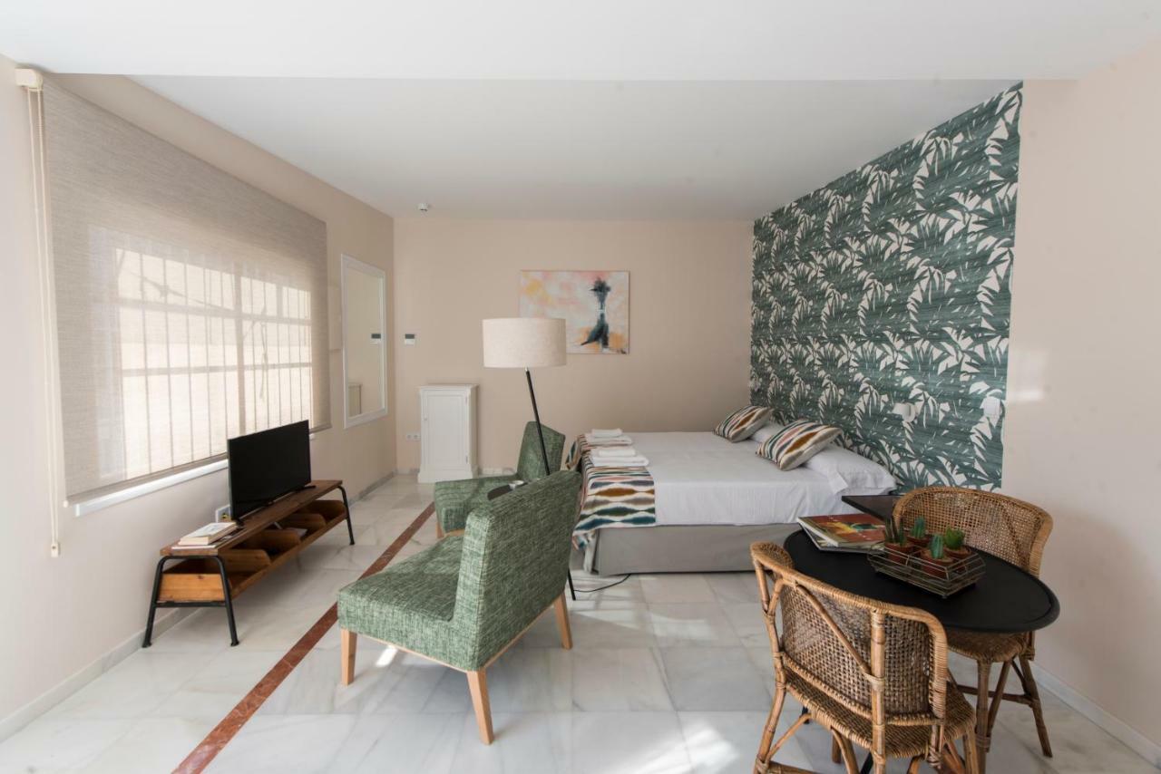 Céntriko Apartments - Quintero 40 Siviglia Esterno foto